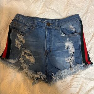 Distressed Blue Denim Shorts.